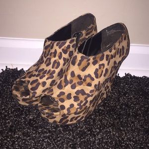 Size 6, cheetah print wedges.